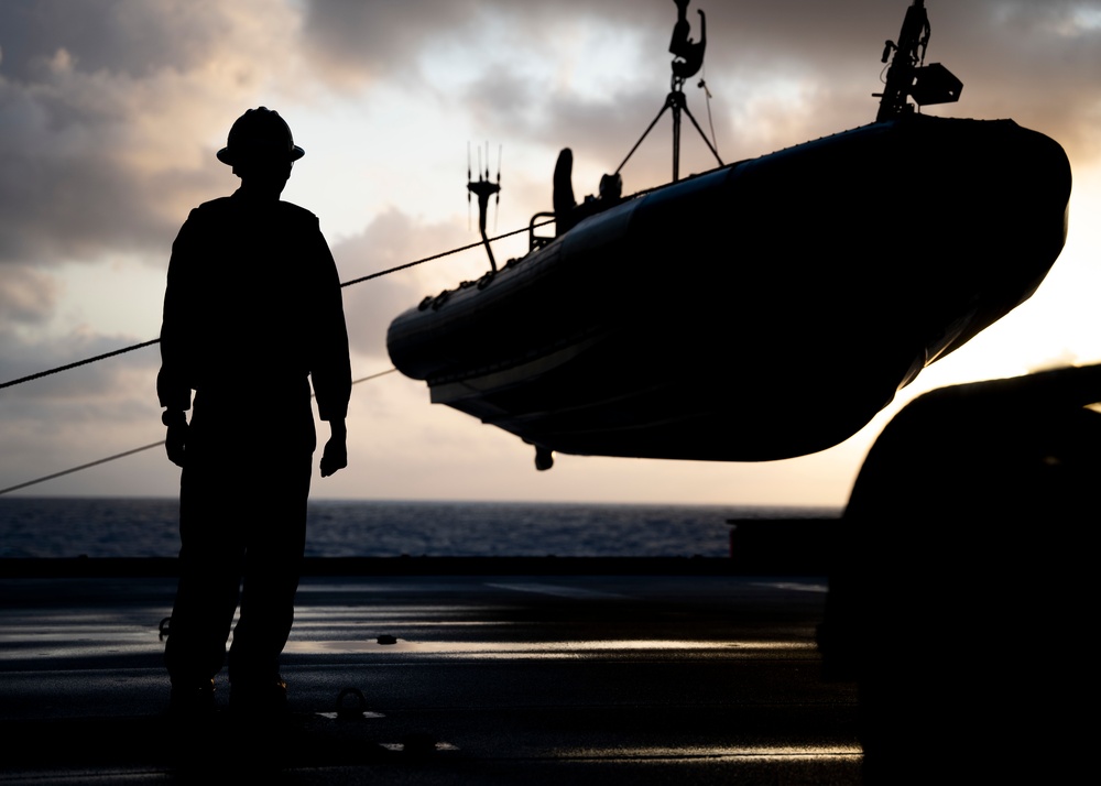 Sailors deploy small boats