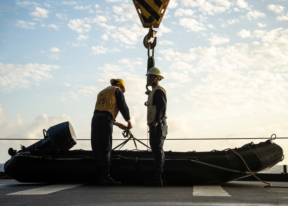 Sailors deploy small boats