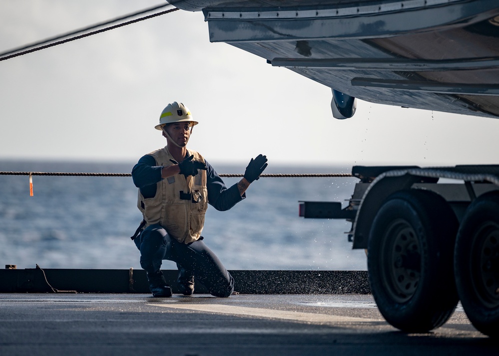 Sailors deploy small boats
