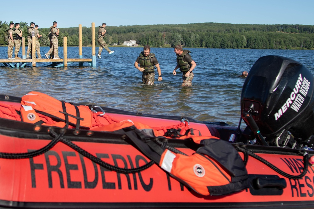 Frederic Firefighters provide EMT rescue swimmer to Northern Strike helocast operations