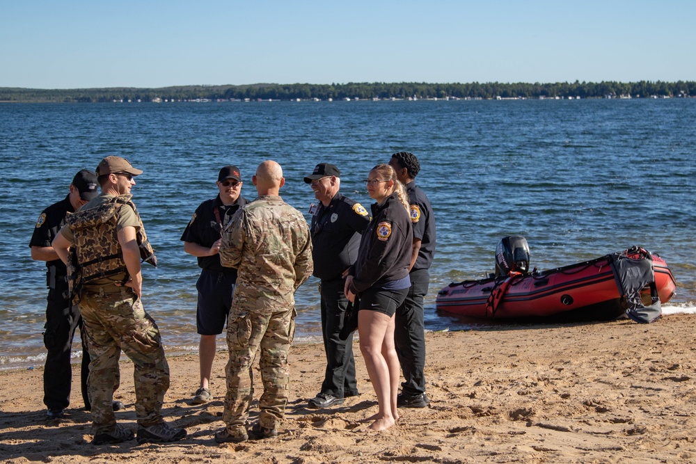 Frederic Firefighters provide EMT rescue swimmer to Northern Strike helocast operations