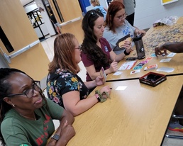 BACH staff head back to middle school with education partner