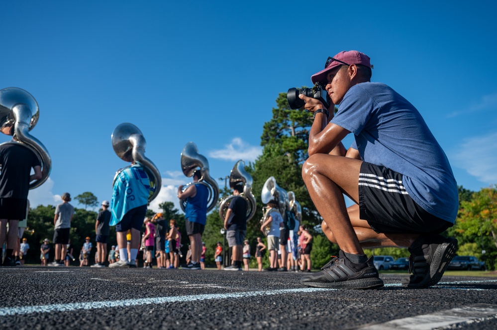 One time at band camp: Airman volunteers with local marching band