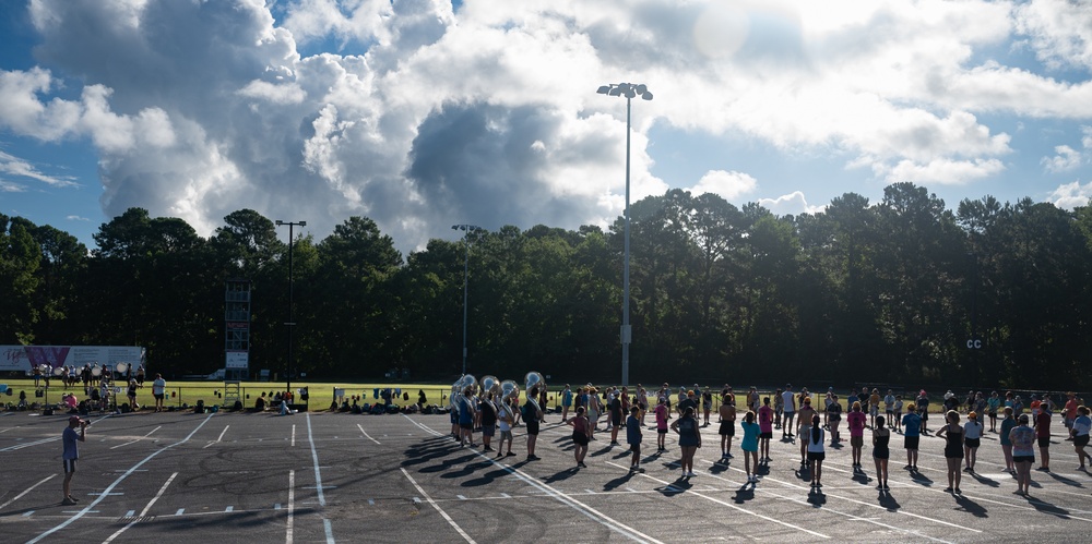 One time at band camp: Airman volunteers with local marching band