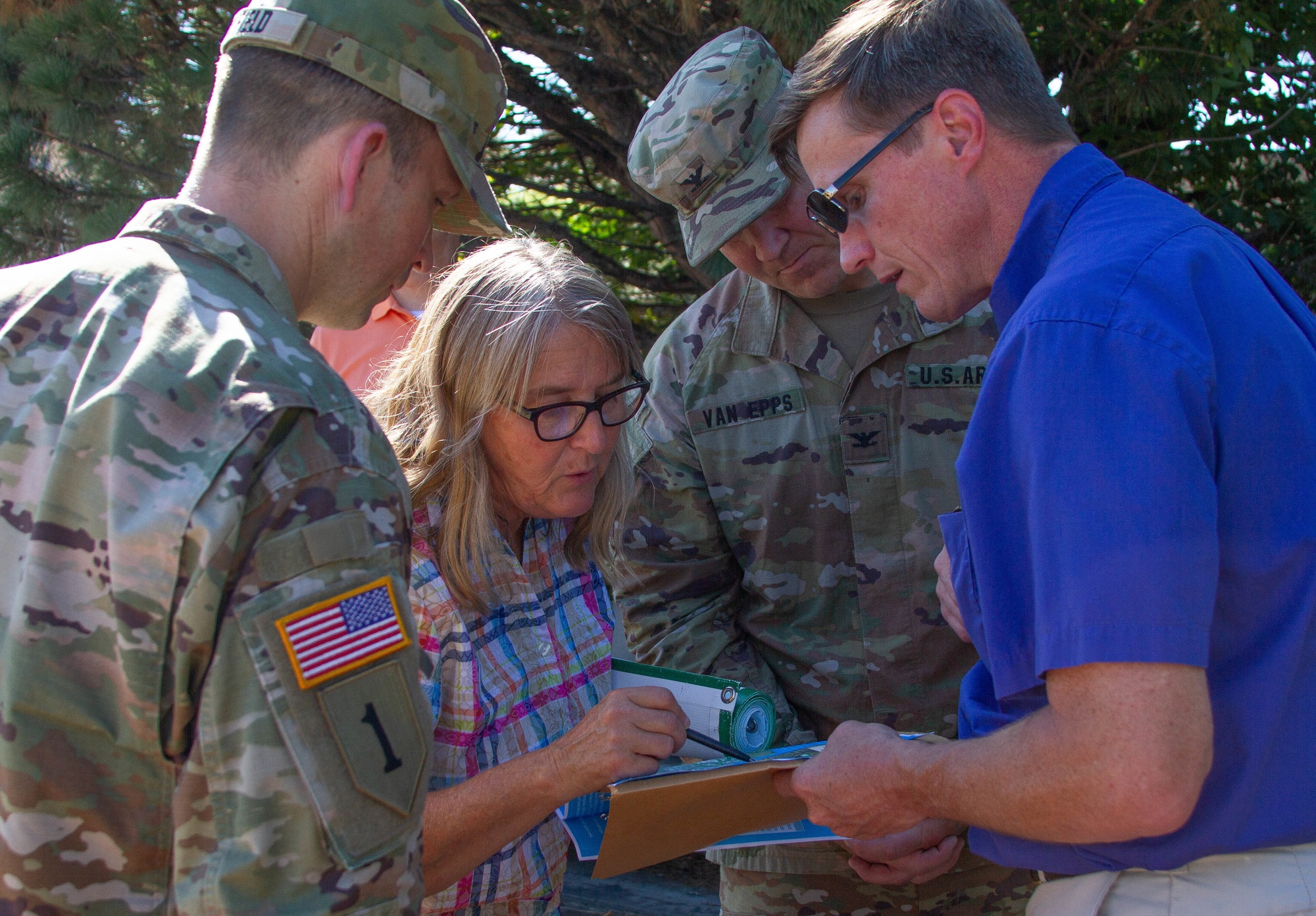 DVIDS - Images - Col. Van Epps, Col. Rayfield, Jeff and Martha Tasker examine a map [Image of 9]