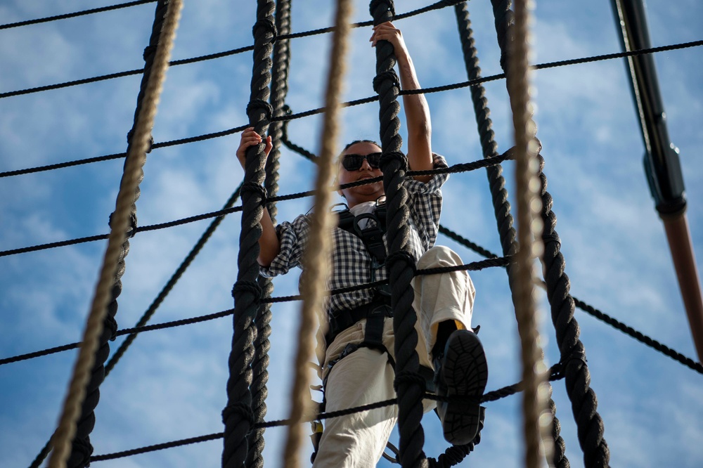 Sailor climbs aboard USS Constituiton