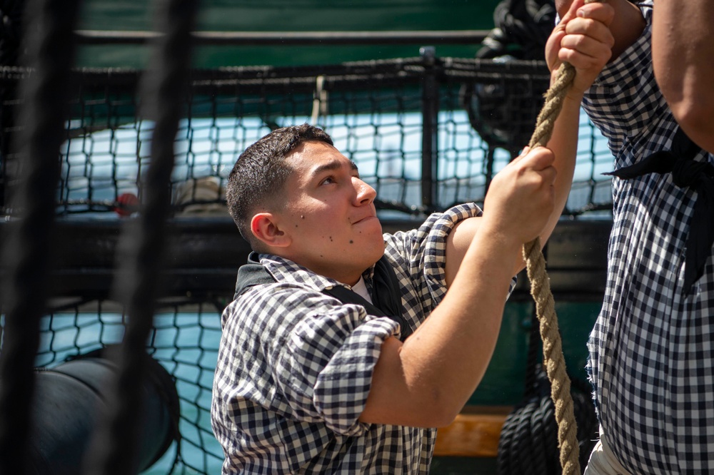 Sailor line handles aboard USS Constituiton