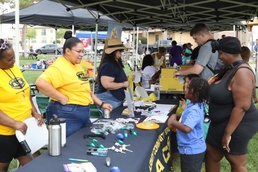 ACS Staff hand out gifts