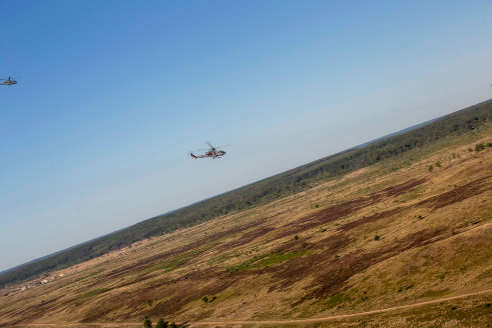 Marines with Marine Light Attack Helicopter Squadron (HMLA) 167 support exercise Northern Strike 22-2