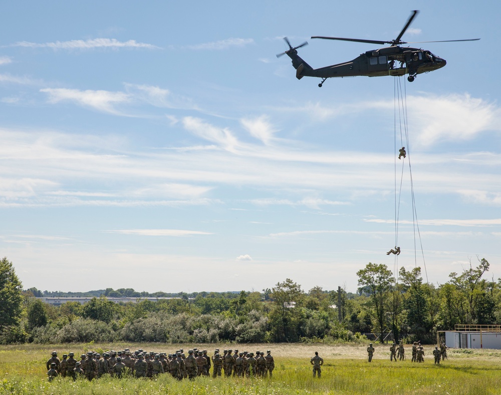 Soldiers rappel from UH-60 Black Hawk During Air Assault