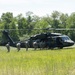 Soldiers rappel from UH-60 Black Hawk During Air Assault