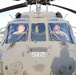 TNARNG officers perform preflight checks before an air assault mission during Northern Strike 22