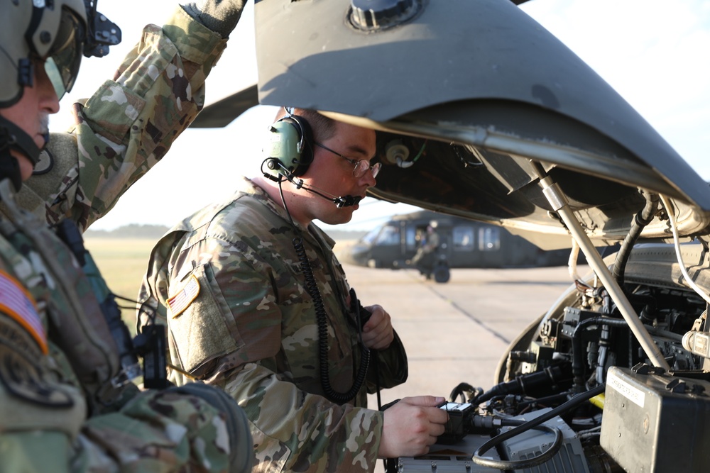 TNARNG officer performs a preflight check during Northern Strike 22