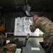 The 29th CAB staff prepares for an air assault mission in the Tactical Command Post