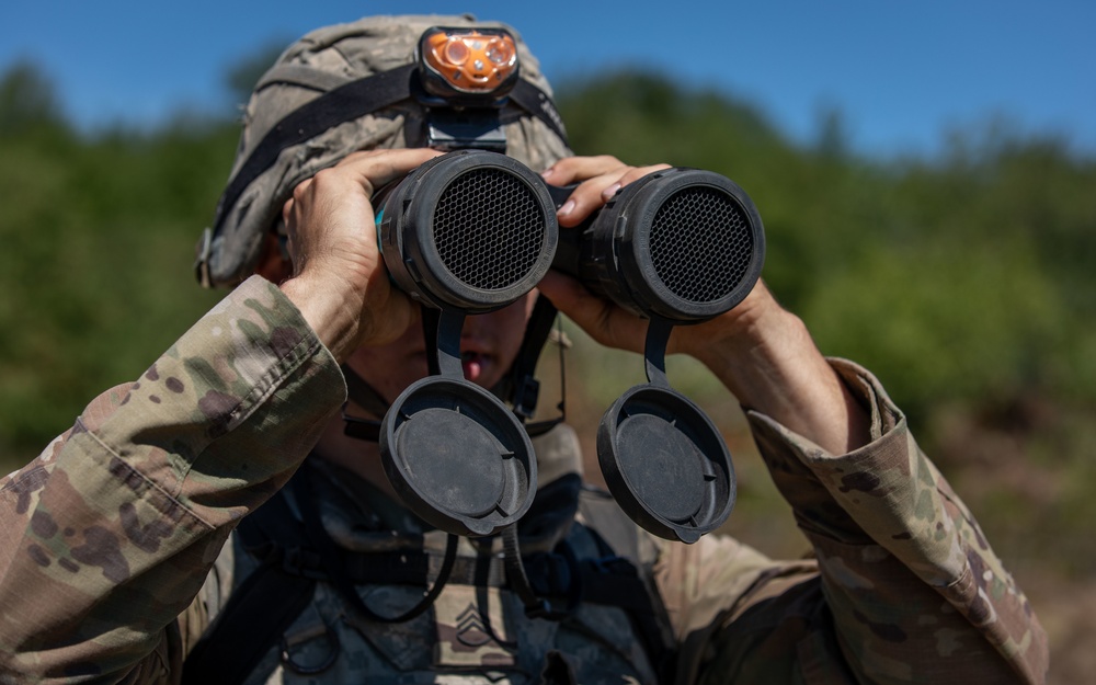 1-134th Field Artillery Regiment conduct a fire mission at Northern Strike 22