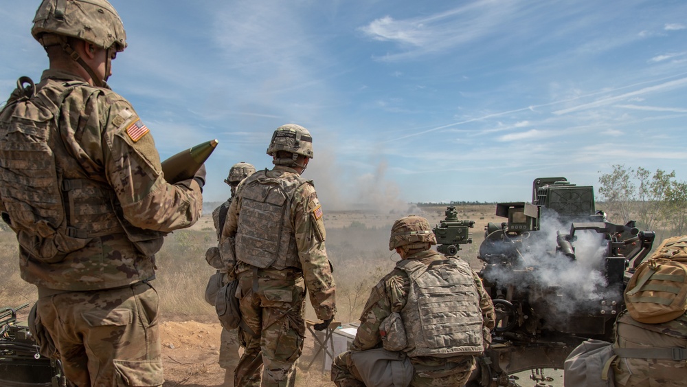 1-134th Field Artillery Regiment conduct a fire mission at Northern Strike 22