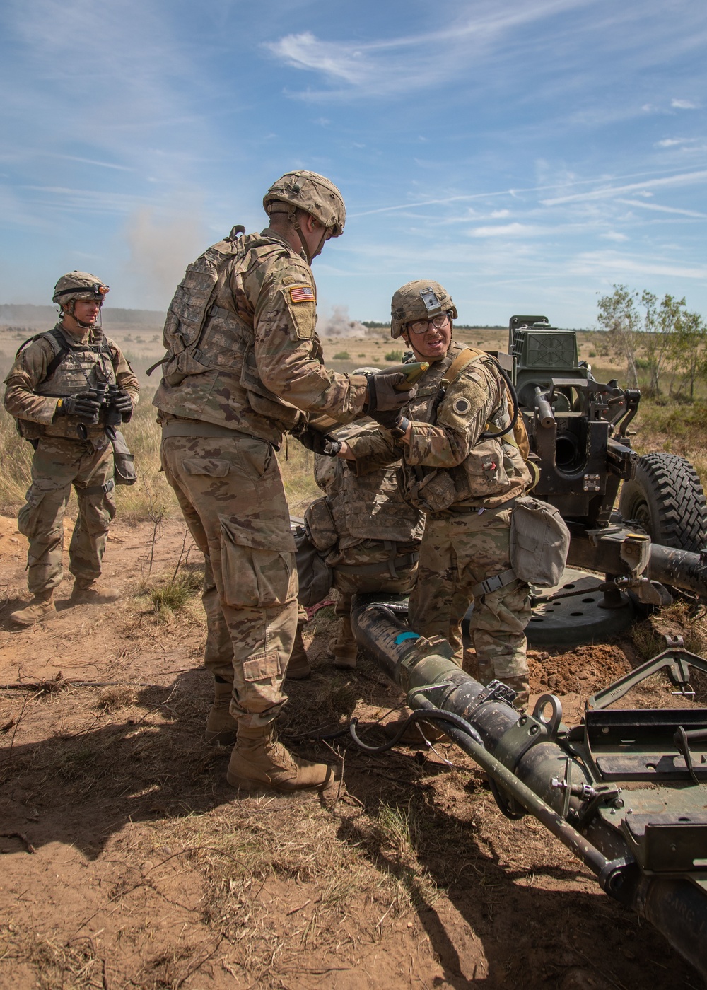 1-134th Field Artillery Regiment conduct a fire mission at Northern Strike 22