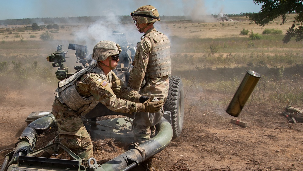 1-134th Field Artillery Regiment conduct a fire mission at Northern Strike 22