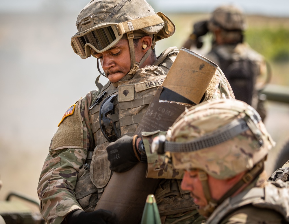 1-134th Field Artillery Regiment conduct a fire mission at Northern Strike 22