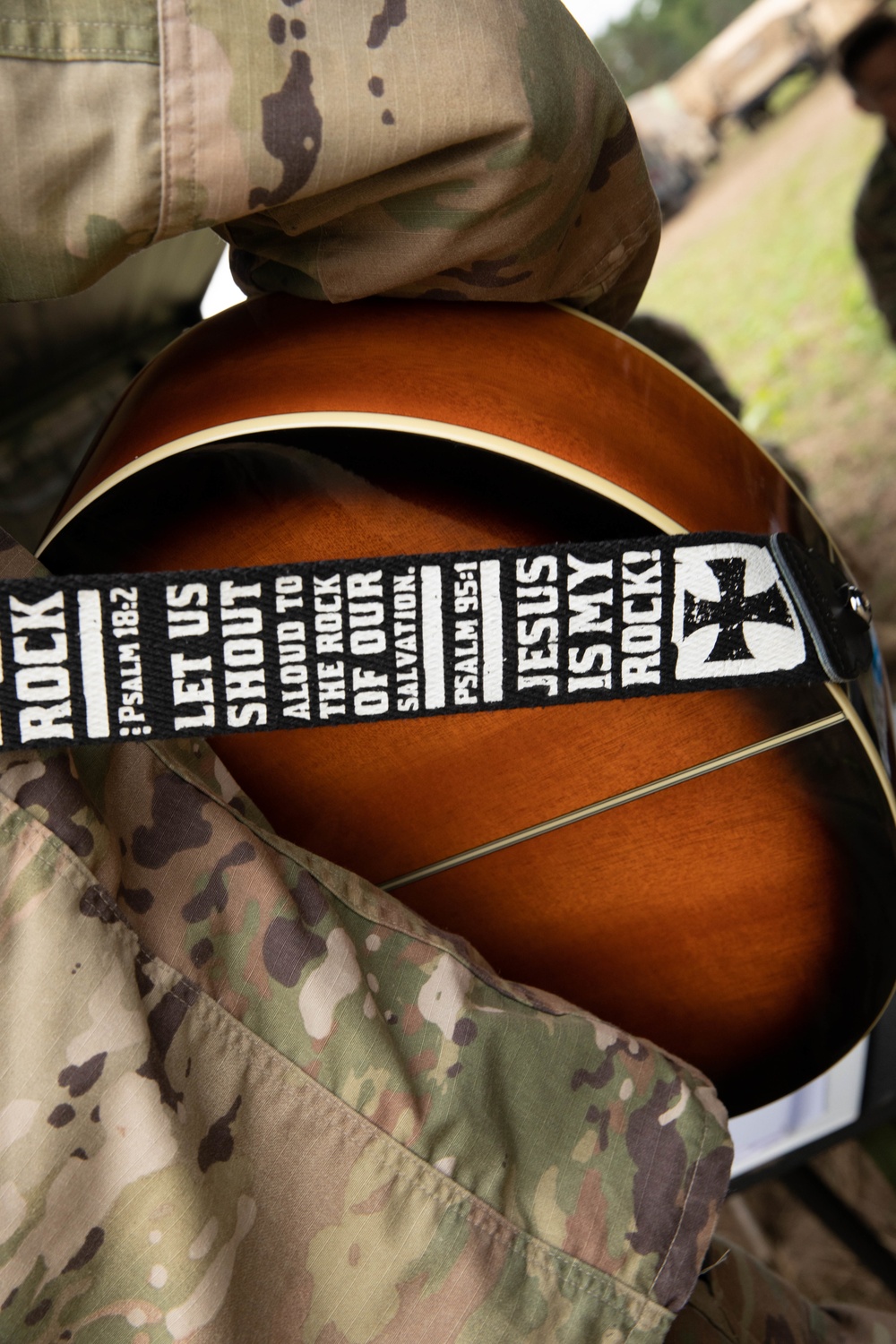 Spc. Isaiah Pleiman Leads in Song During Religious Service at Northern Strike 22-2