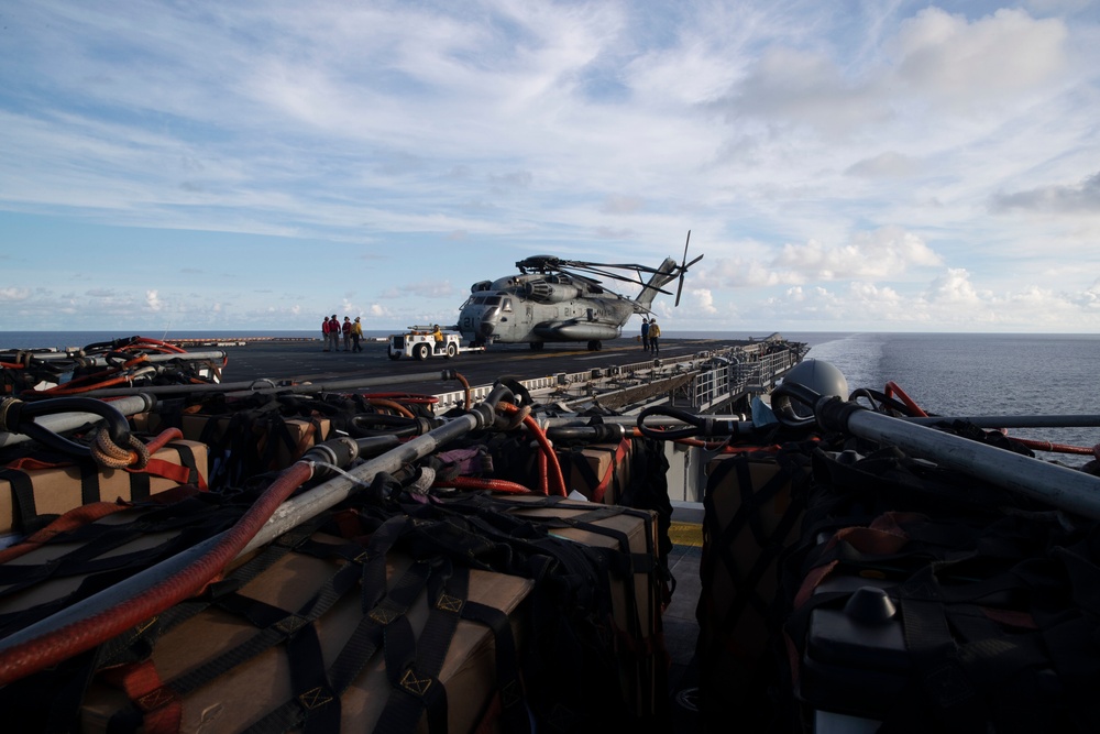 USS Tripoli Conducts Vertical Replenishment