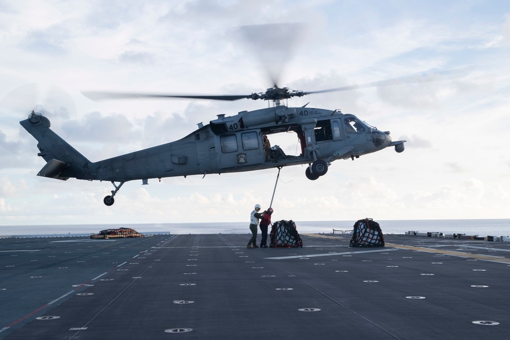 USS Tripoli Conducts Vertical Replenishment