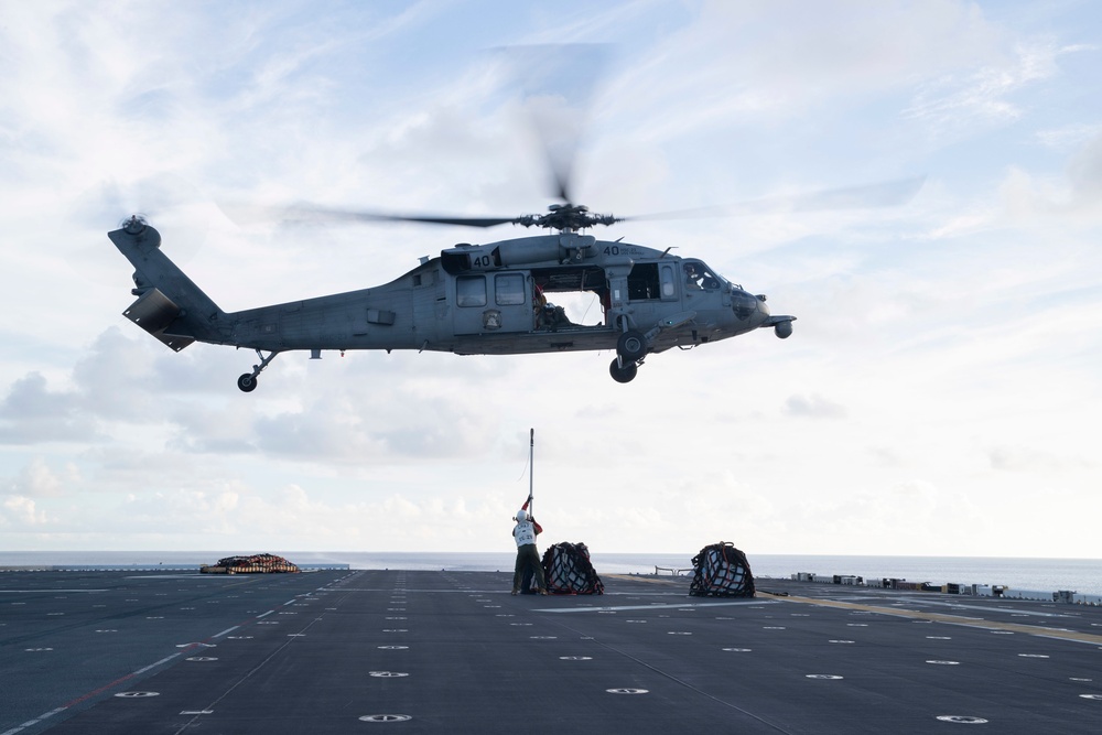 USS Tripoli Conducts Vertical Replenishment