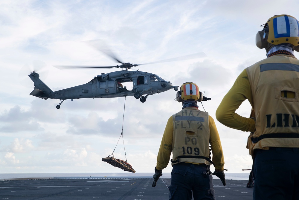 USS Tripoli Conducts Vertical Replenishment