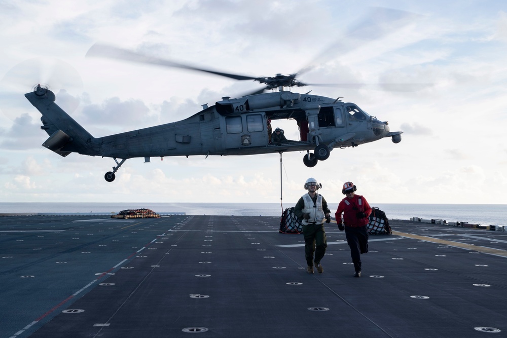 USS Tripoli Conducts Vertical Replenishment