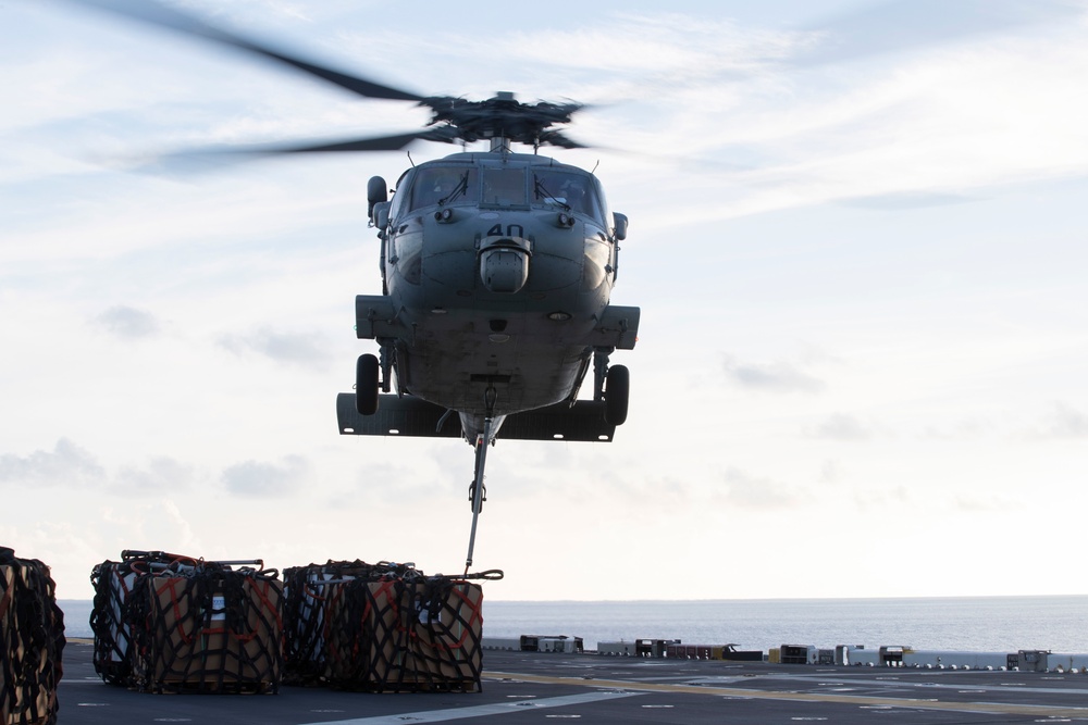 USS Tripoli Conducts Vertical Replenishment