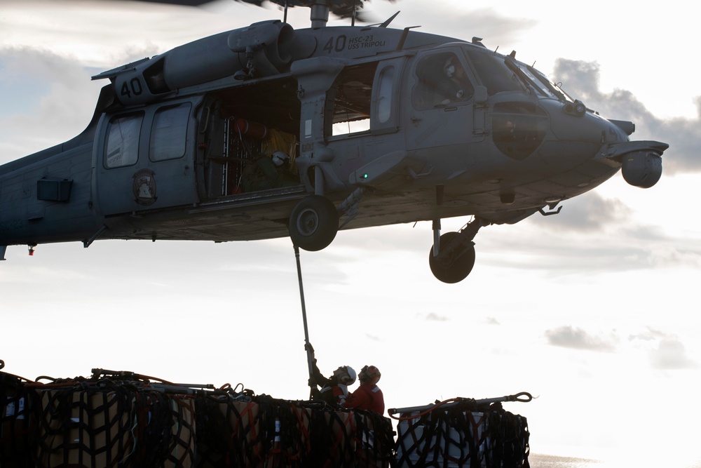 USS Tripoli Conducts Vertical Replenishment