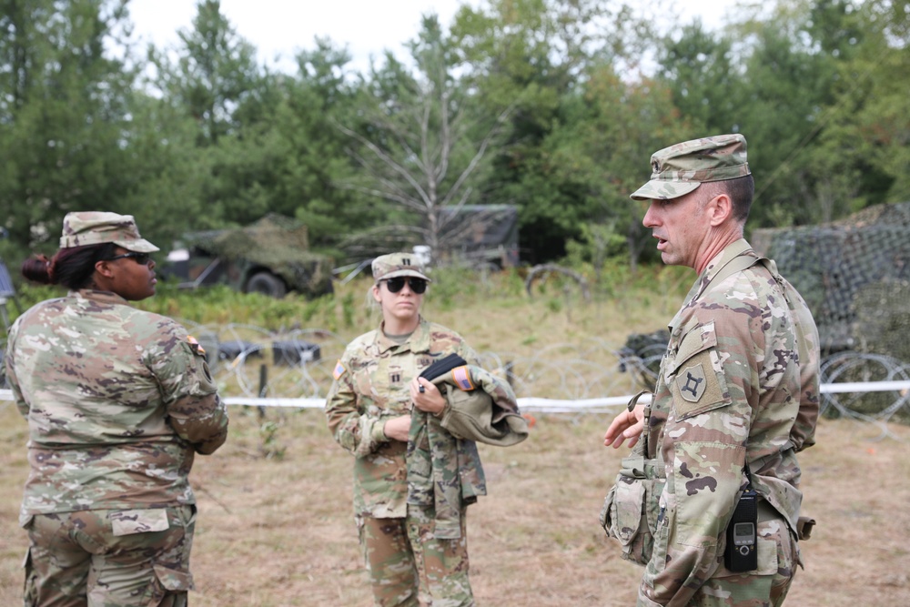 FLARNG officer briefs MDARNG officers in his AO during Northern Strike 22