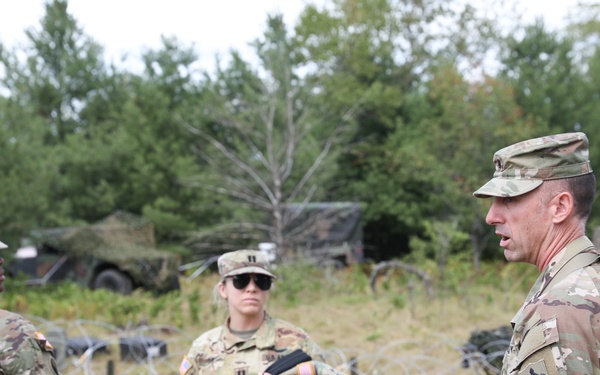 FLARNG officer briefs MDARNG officers in his AO during Northern Strike 22