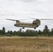 CH-47 chinook takes off from a field during Northern Strike 22