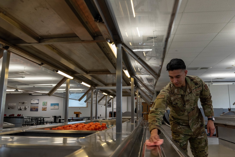 Staff Sgt. Peter Butler cleaning service station at drill weekend Aug. 13, 2022