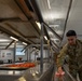 Staff Sgt. Peter Butler cleaning service station at drill weekend Aug. 13, 2022