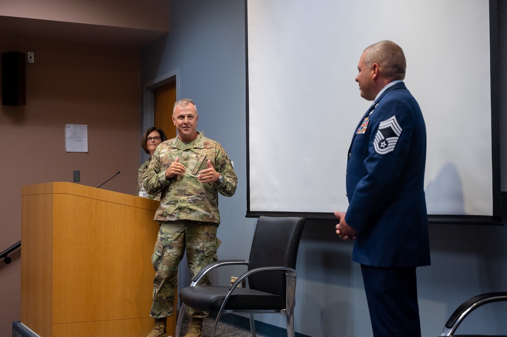 Senior Master Sgt. Andrew Edenburn promoted to chief master sergeant Aug. 14, 2022