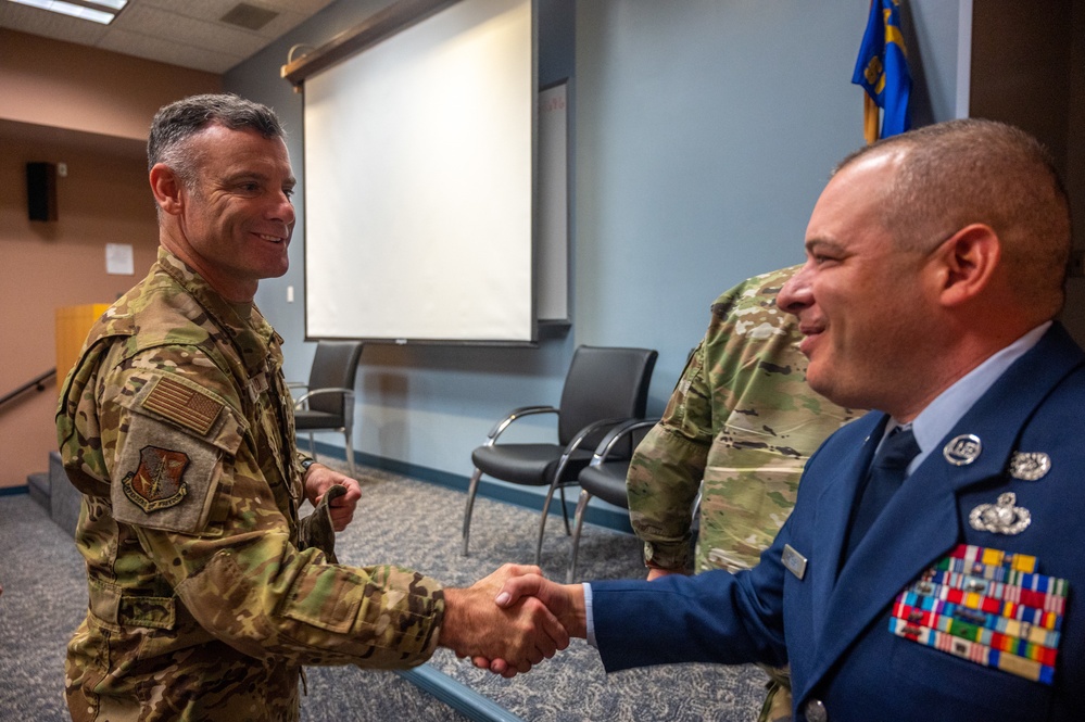 Senior Master Sgt. Andrew Edenburn promoted to chief master sergeant Aug. 14, 2022