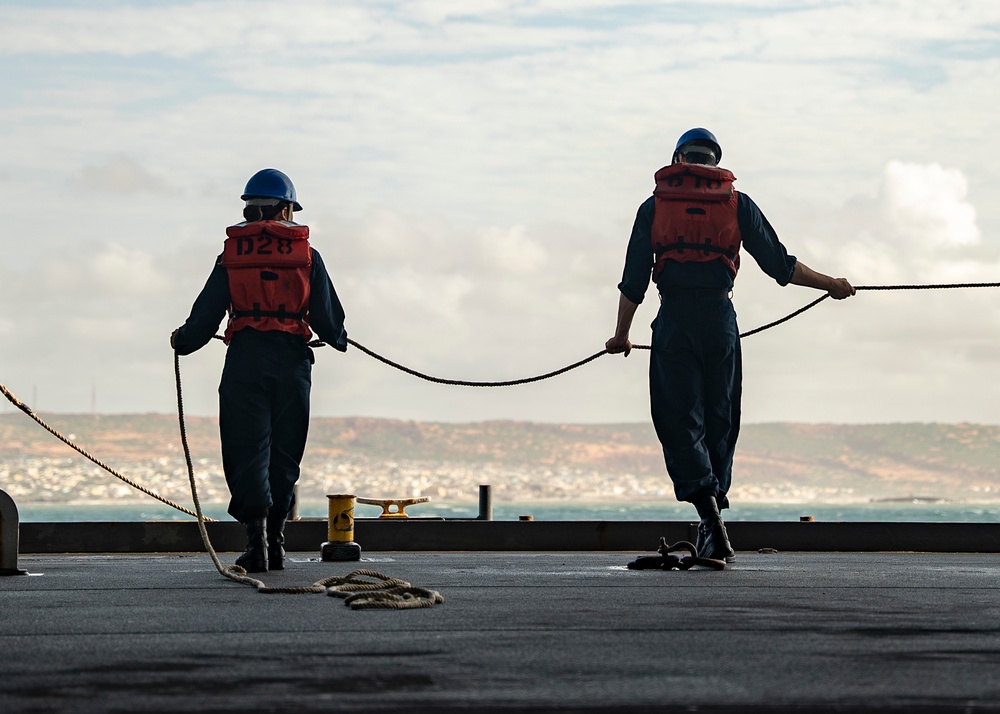 Sailors deploy small boats