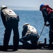 Sailors deploy small boats