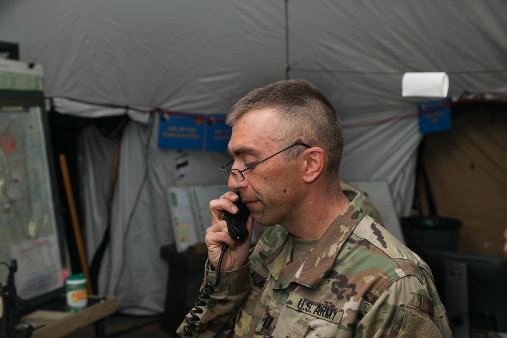 The 29th CAB signal officer checks communications