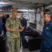 Mission Commander of Pacific Partnership 2022 presents coins to Sailors