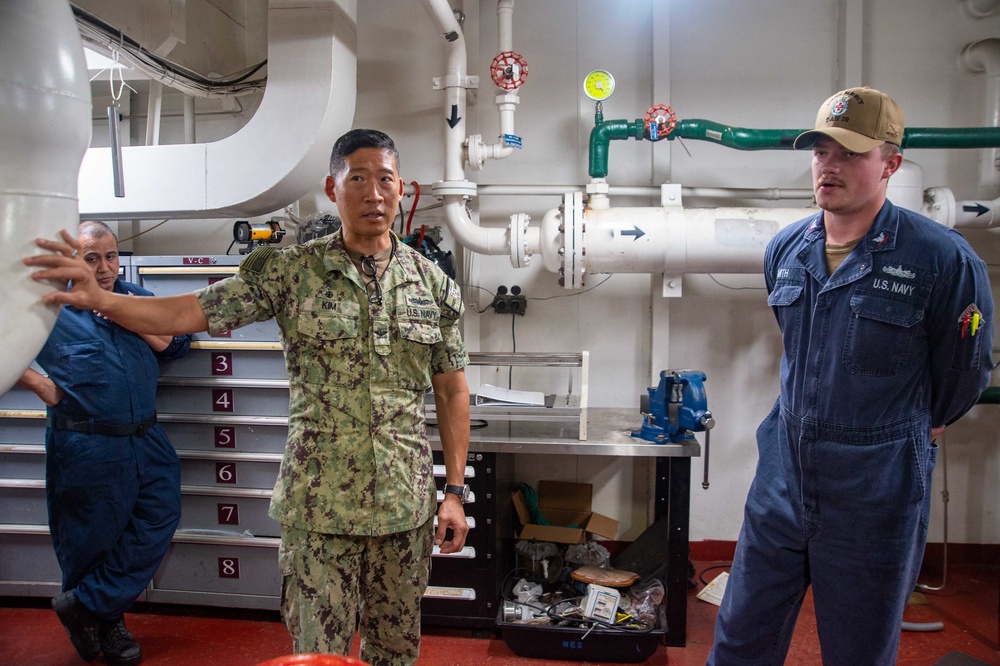 Pacific Partnership 2022 Mission Commander presents coins to Sailors