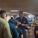 USNS Mercy Sailors conduct quarters aboard USNS Mercy (T-AH 19)