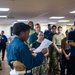 USNS Mercy Sailors conduct quarters aboard USNS Mercy (T-AH 19)