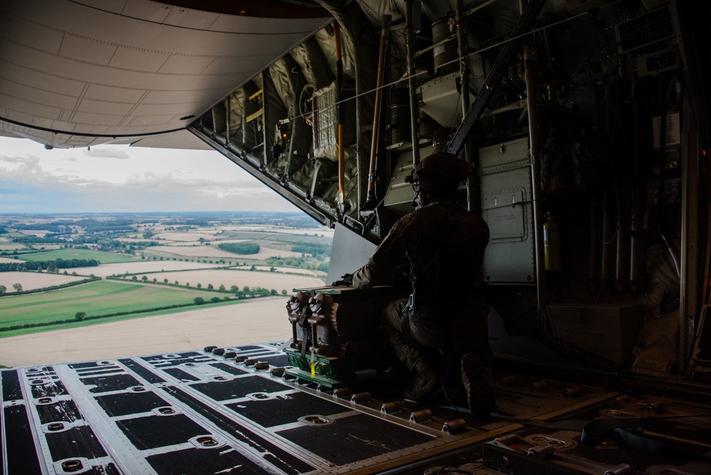 MC-130J Commando IIs conduct nighttime three-ship formation operations