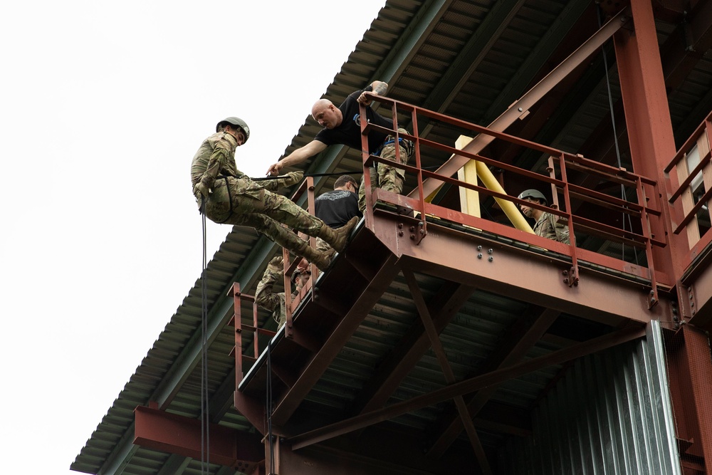 Service Members attack Air Assault Rappel Tower at Fort Indiantown Gap