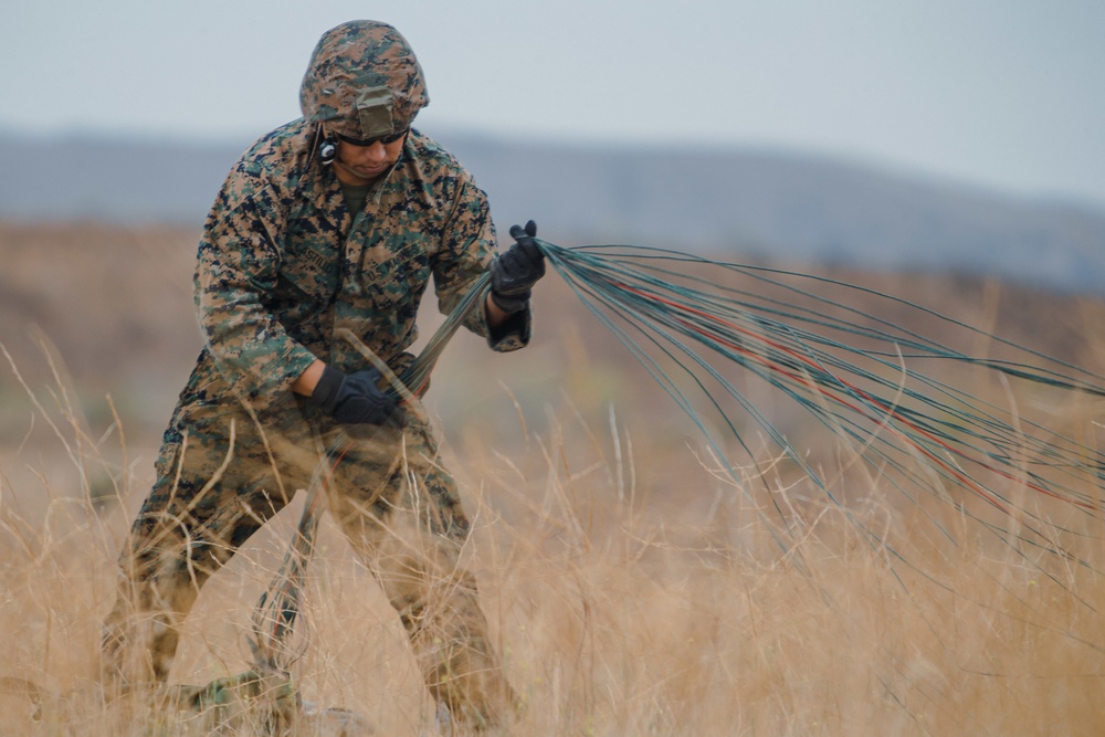 3rd ANGLICO parachute from a KC-130J Hercules on Camp Pendleton