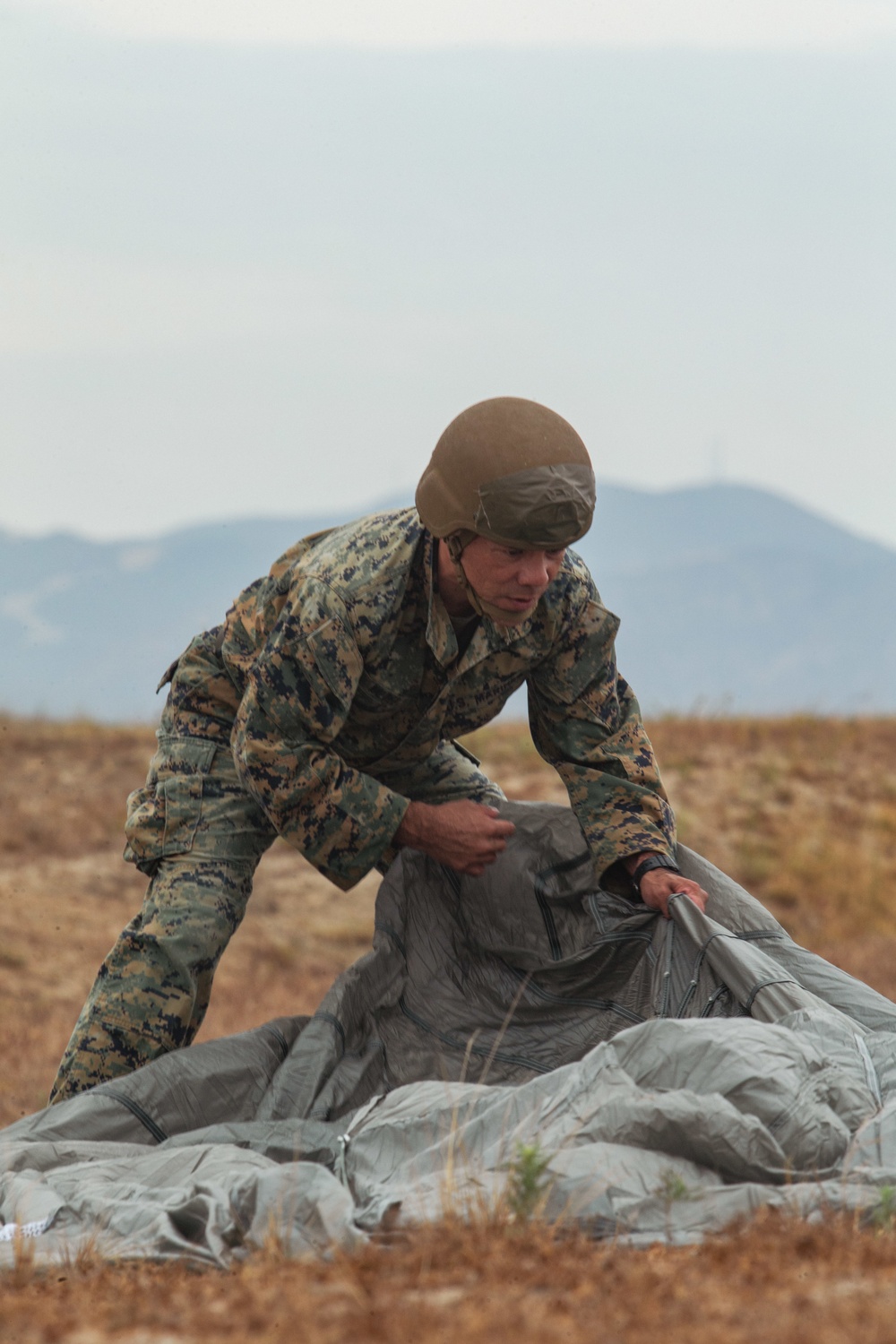 3rd ANGLICO parachute from a KC-130J Hercules on Camp Pendleton