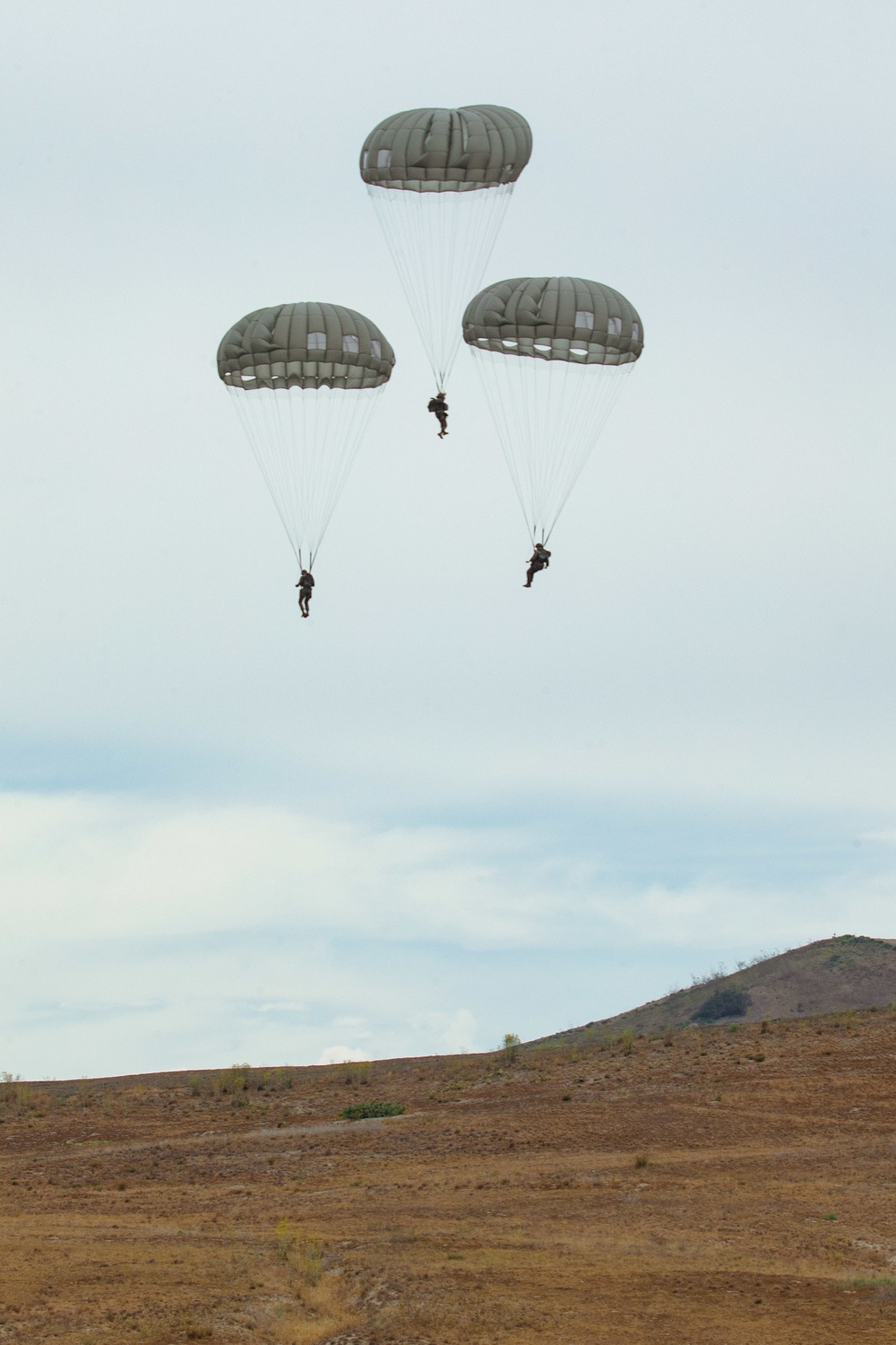 3rd ANGLICO parachute from a KC-130J Hercules on Camp Pendleton